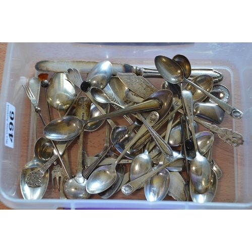 496 - tub of silver spoons