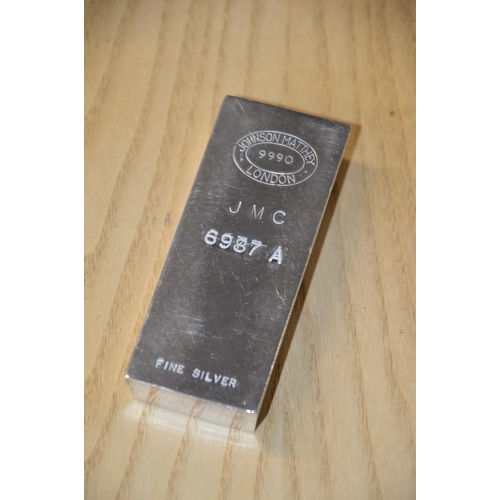 321 - fine silver bar, Johnson Matthey paperweight, 458g