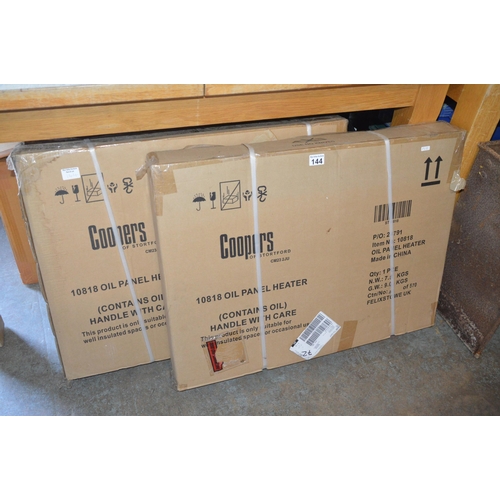 144 - 2 new in box oil panel heaters