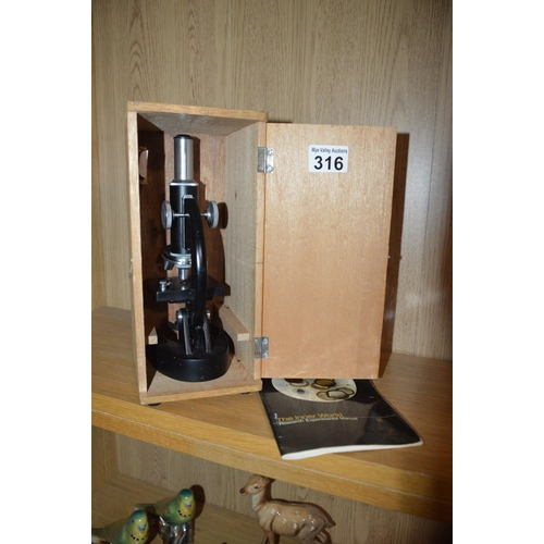 316 - cased microscope