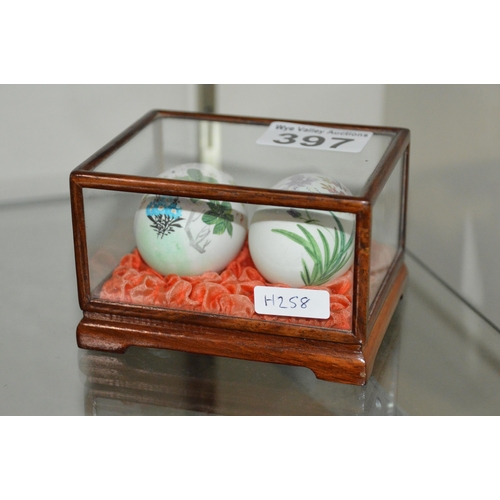 397 - cased hand painted eggs