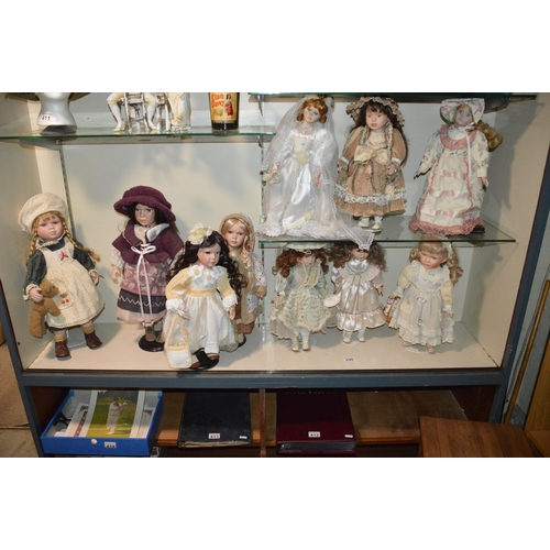 398 - lot of 10 porcelain dolls