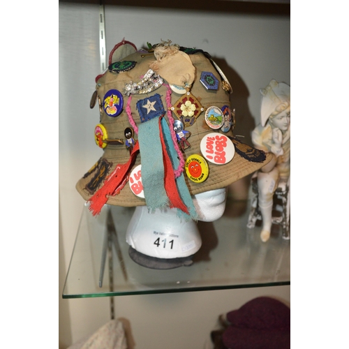 411 - bucket hat with various badges/pins