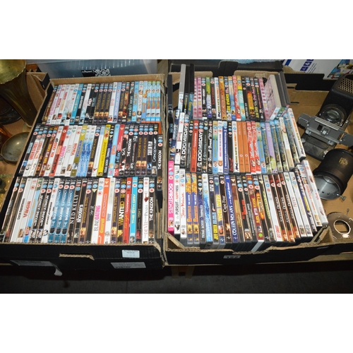 122 - 2 boxes of new dvds