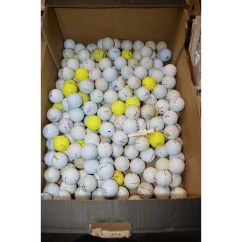 70 - box of golf balls