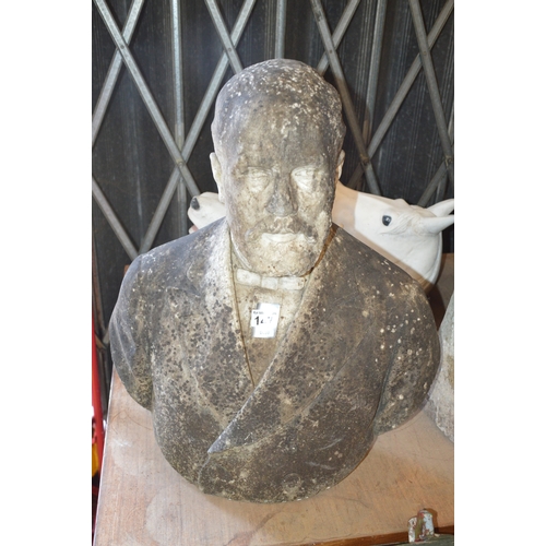 large stone bust of a bearded gentleman