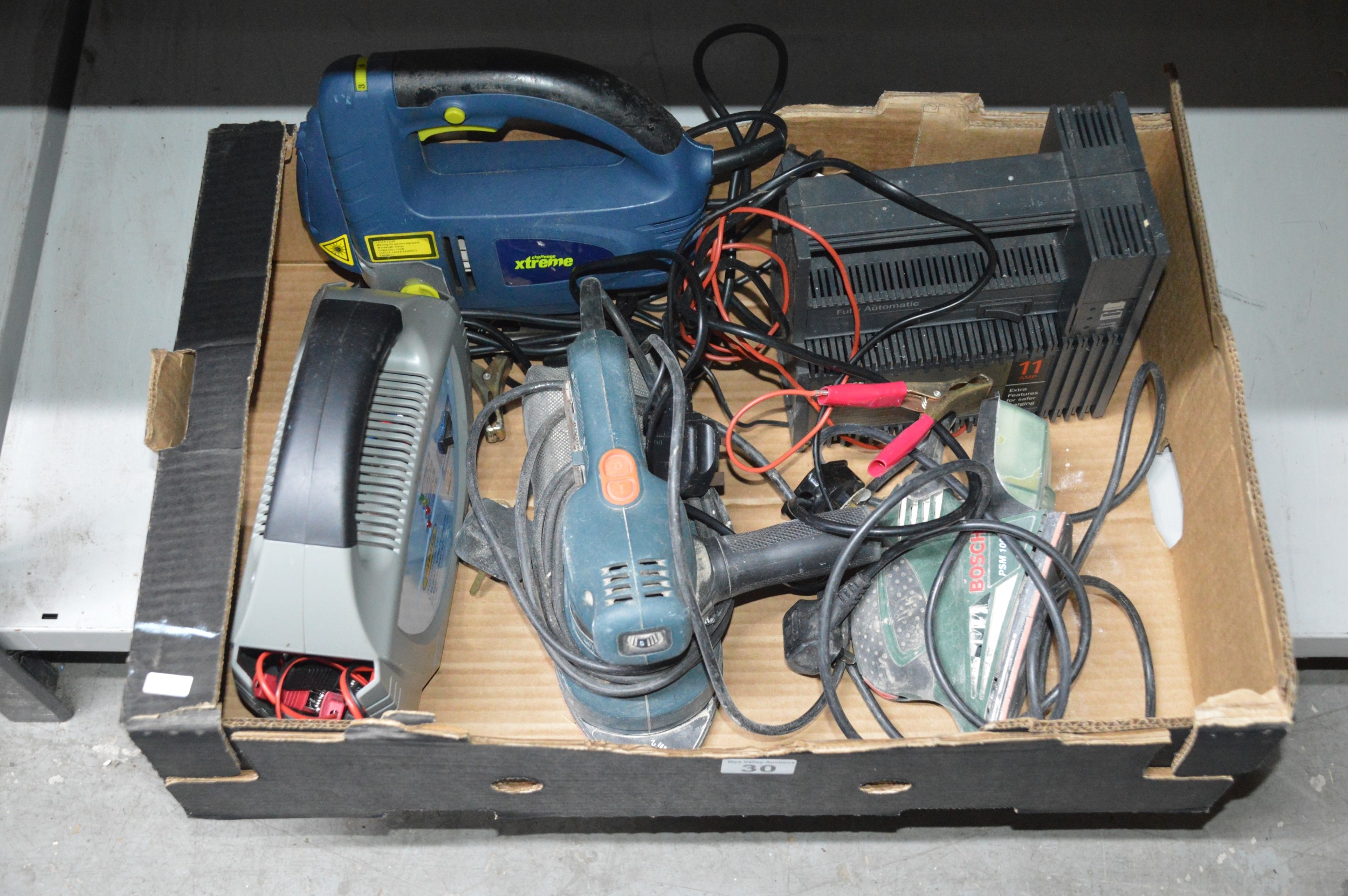 box of assorted power tools