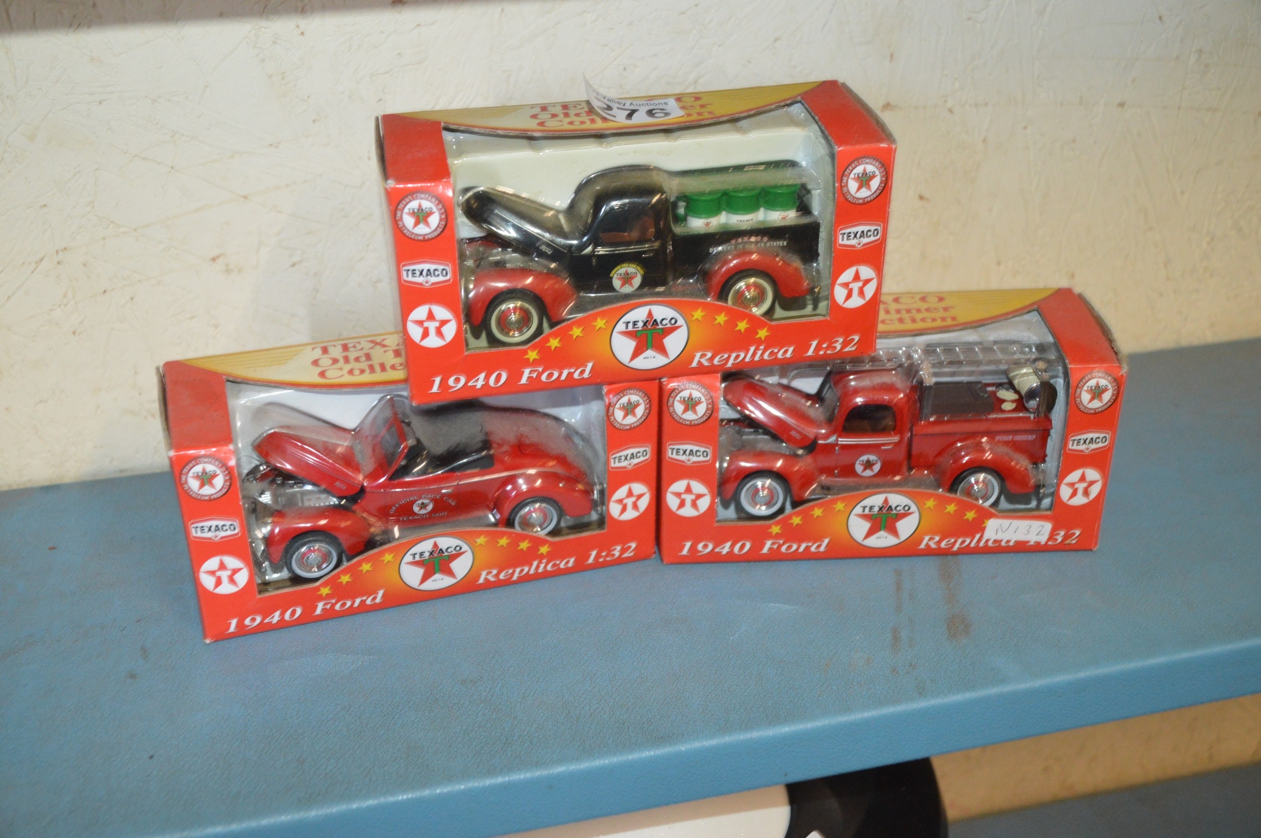 3 boxed ford replica model trucks