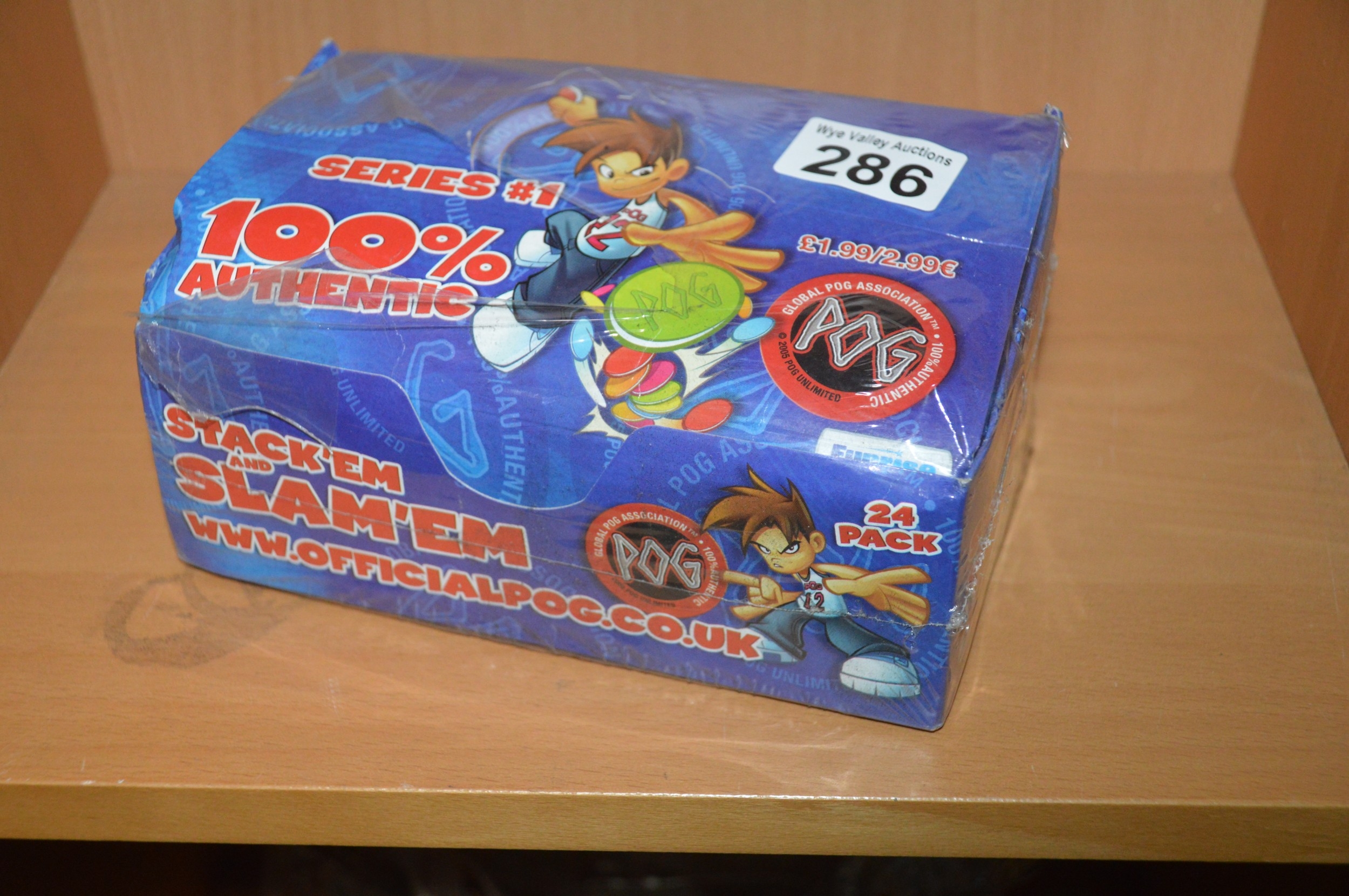 2005 sealed box of pogs (24 packs of 5)