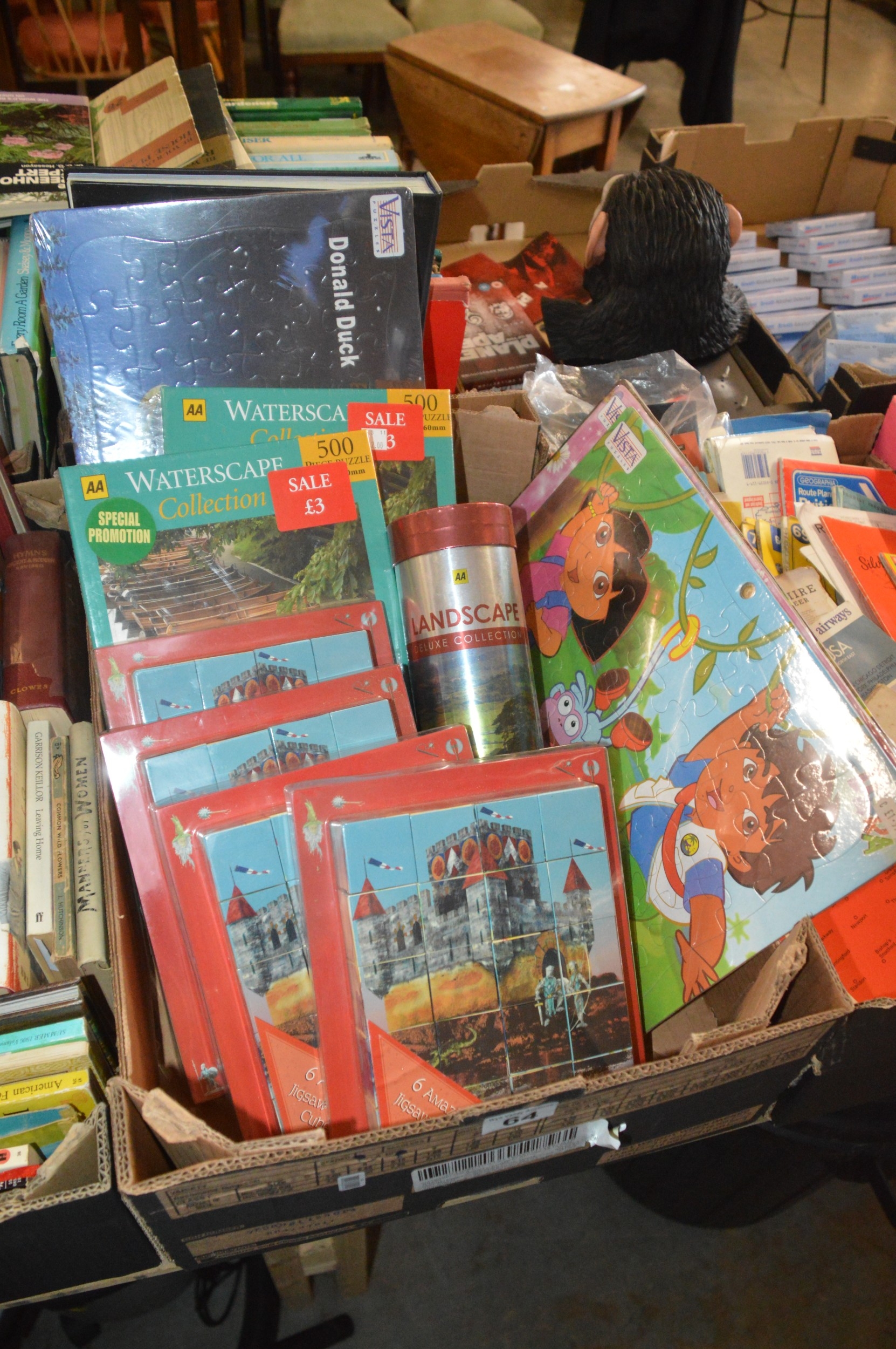 box of assorted sealed puzzles & jigsaws