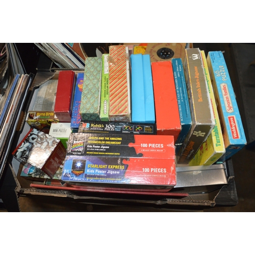 60 - box of assorted puzzles