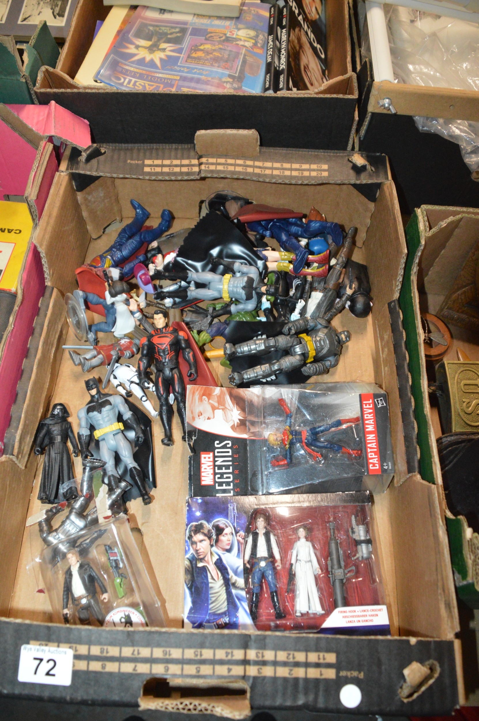 box of marvel figures etc.
