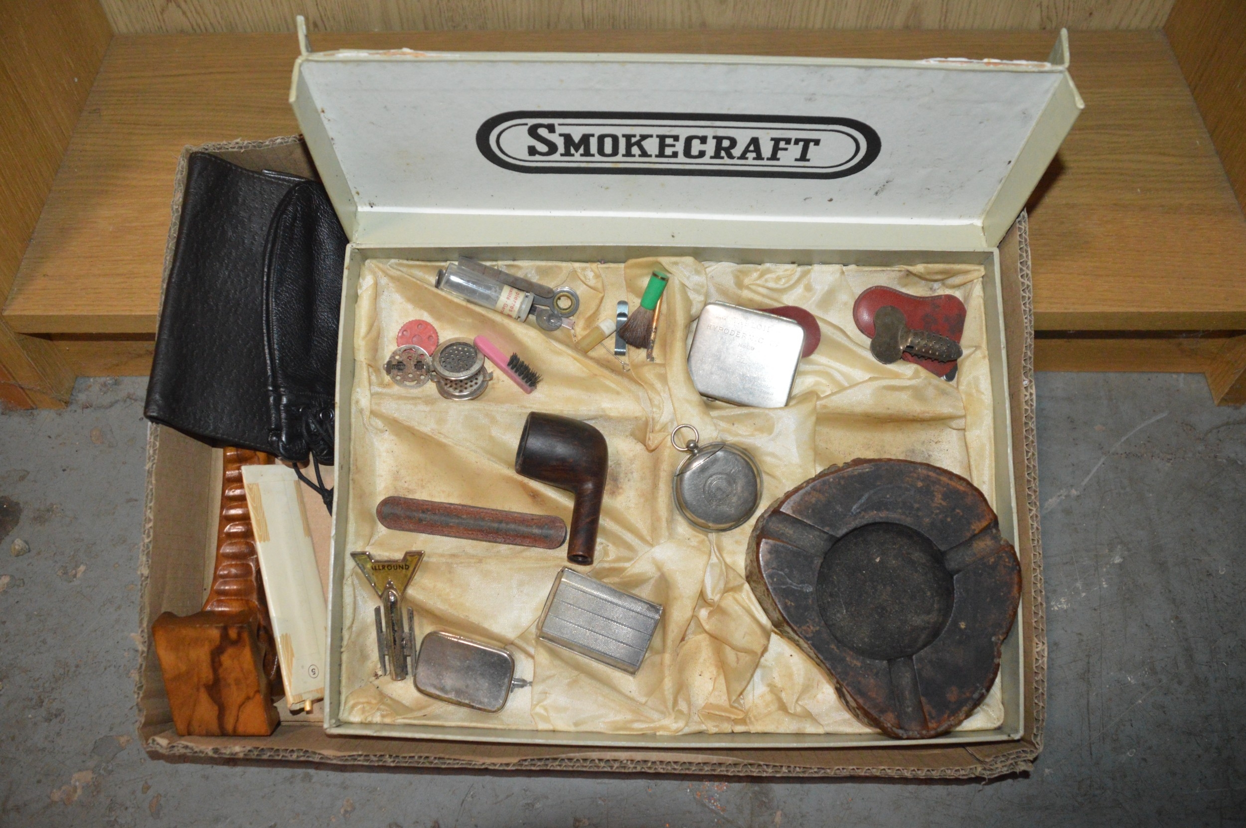 box of vintage smoking paraphernalia