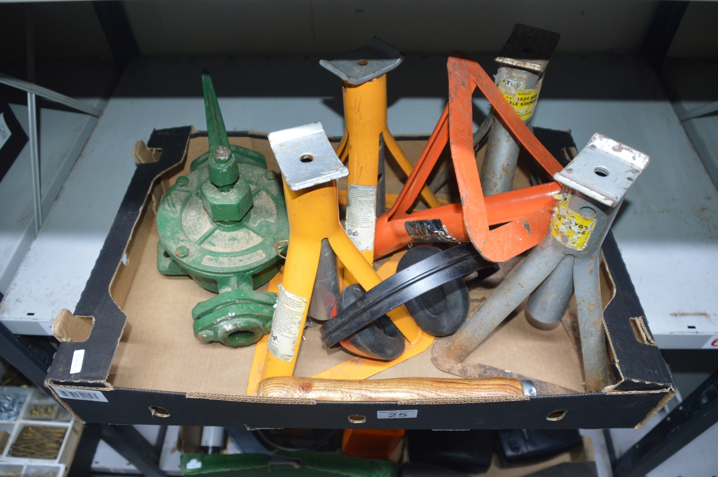 box of axel stands etc.