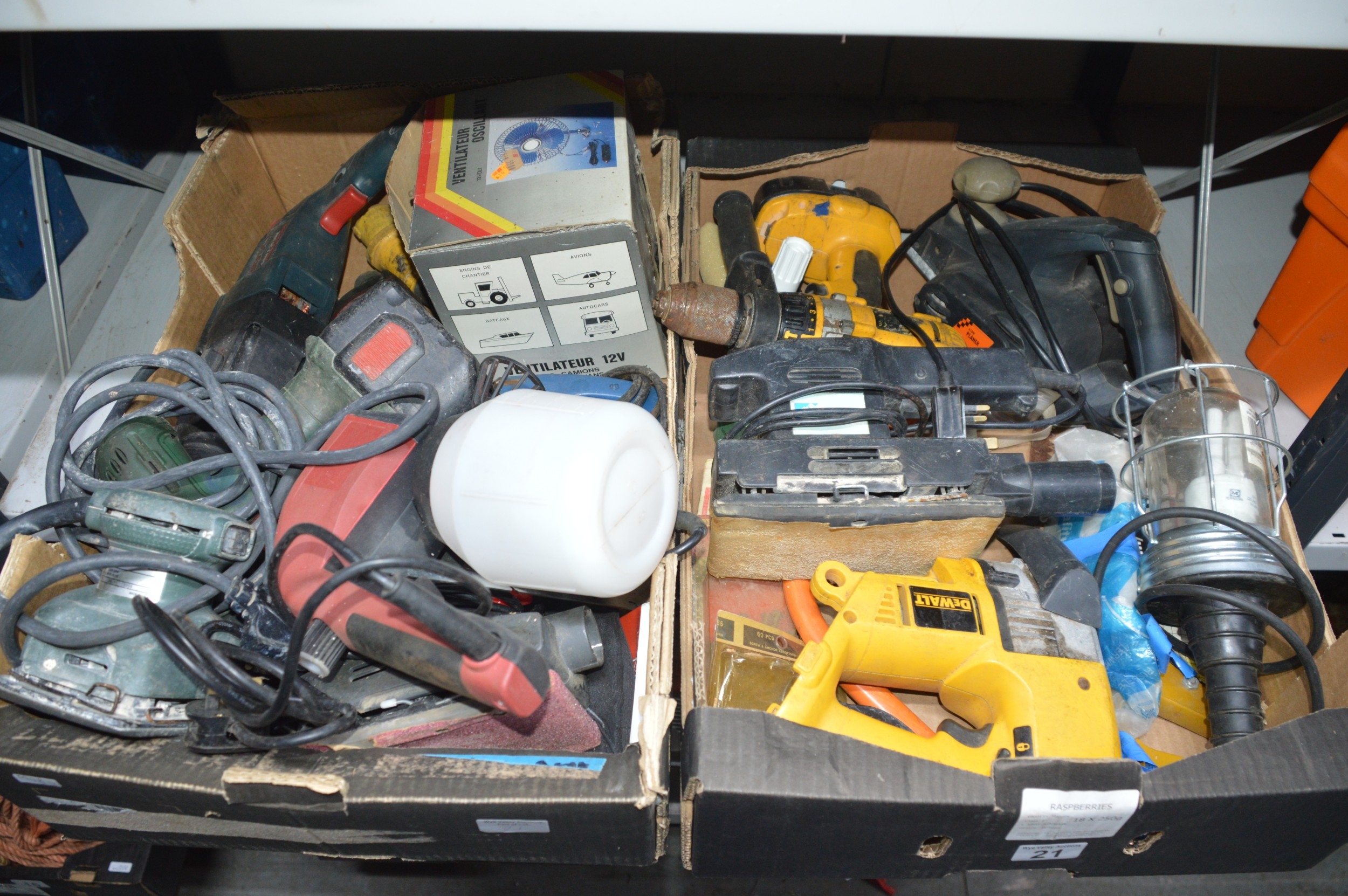 2 boxes of various power tools