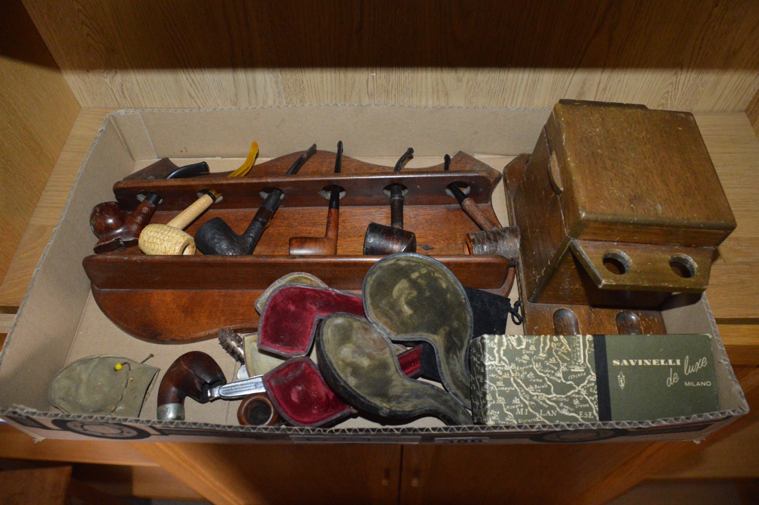 box of pipe smoking paraphernalia