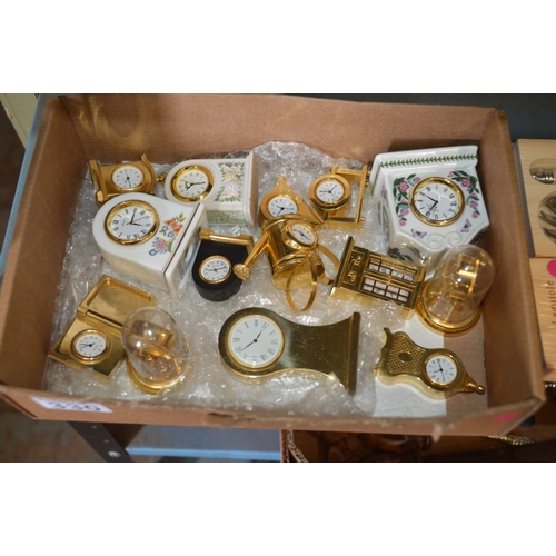 box of miniature clocks