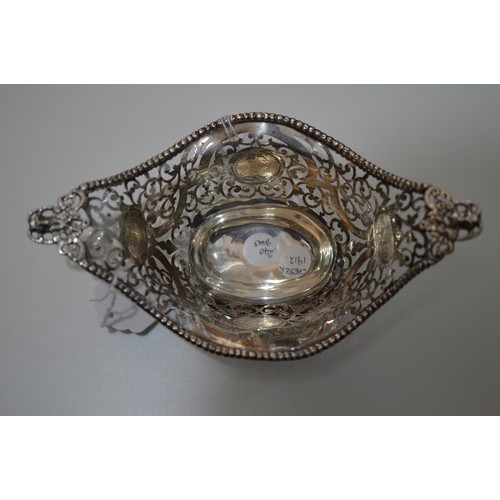 38 - Silver pierced basket, set with 4 Georgian coins, Chester HM, 240g
