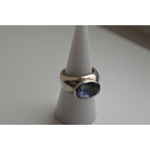 57 - Silver & mystic topaz ring, size 