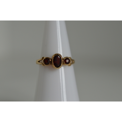 9ct gold 3-stone collet set garnet ring, size K½