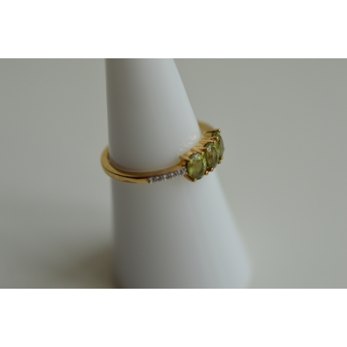 41 - 9ct gold peridot & diamond ring, size L½
