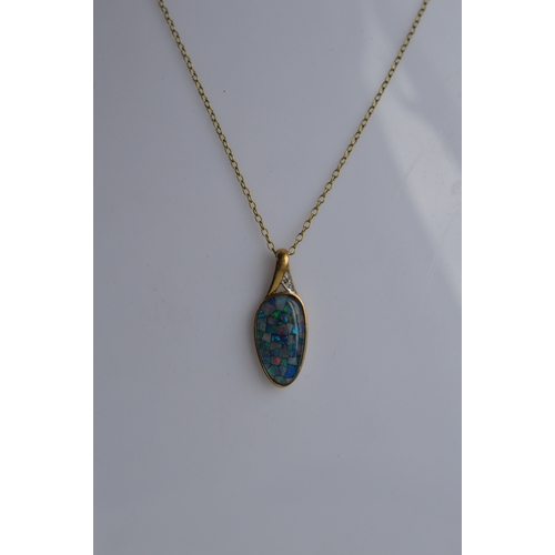 44 - 9ct gold opal & diamond pendant