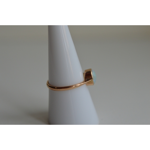55 - 9ct gold opal ring, size P