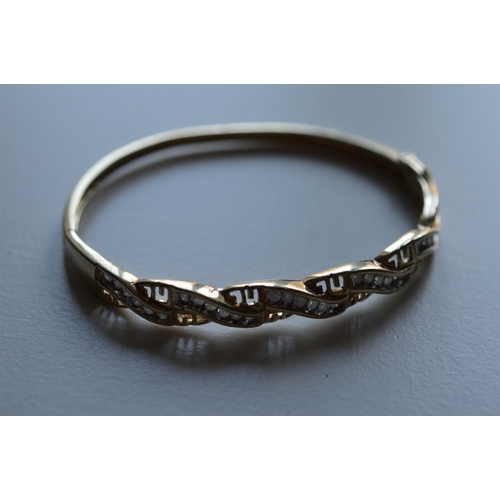 9ct gold & diamond bangle/bracelet, total diam 1.0cts