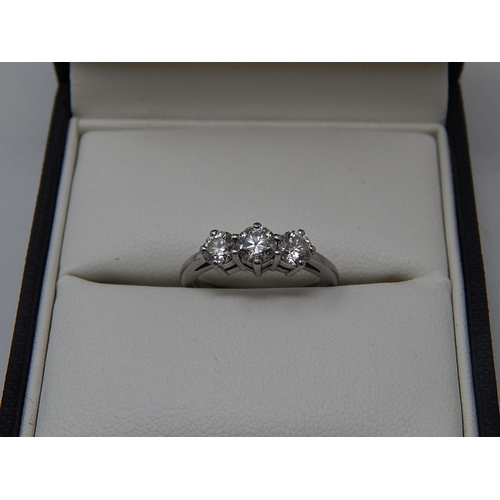 1 - 1ct Platinum Three Stone Diamond Ring, the ring set with 3 round brilliant cut diamonds of excellent... 