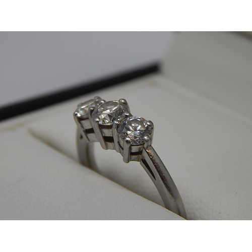 1 - 1ct Platinum Three Stone Diamond Ring, the ring set with 3 round brilliant cut diamonds of excellent... 