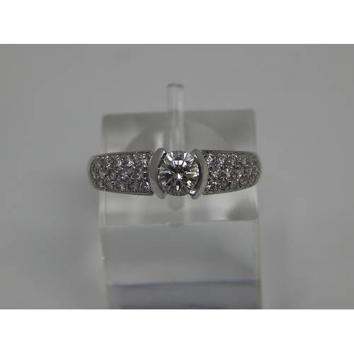 12 - Platinum 950, 1.4ct Diamond Ring Inset with a Central Diamond Approx. 0.80ct & Diamond Shoulders Set... 