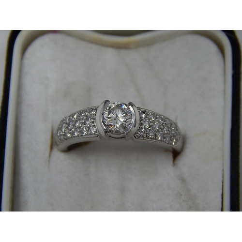 12 - Platinum 950, 1.4ct Diamond Ring Inset with a Central Diamond Approx. 0.80ct & Diamond Shoulders Set... 