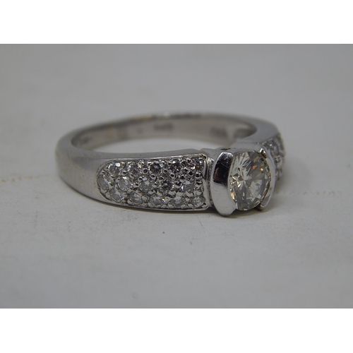 12 - Platinum 950, 1.4ct Diamond Ring Inset with a Central Diamond Approx. 0.80ct & Diamond Shoulders Set... 