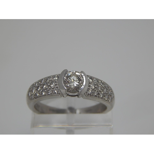 12 - Platinum 950, 1.4ct Diamond Ring Inset with a Central Diamond Approx. 0.80ct & Diamond Shoulders Set... 