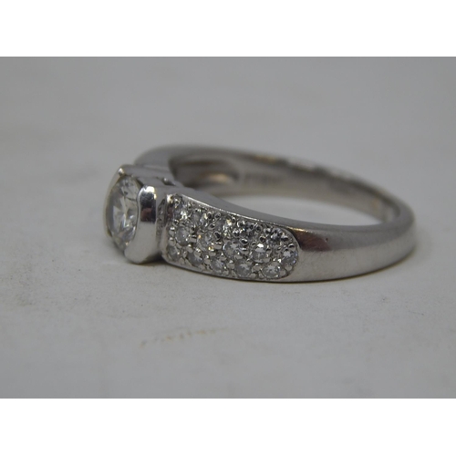 12 - Platinum 950, 1.4ct Diamond Ring Inset with a Central Diamond Approx. 0.80ct & Diamond Shoulders Set... 