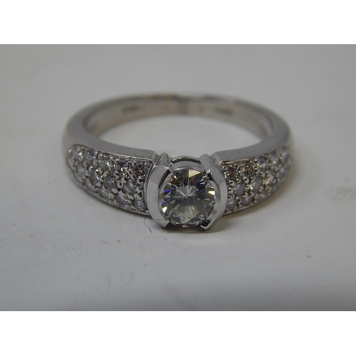 12 - Platinum 950, 1.4ct Diamond Ring Inset with a Central Diamond Approx. 0.80ct & Diamond Shoulders Set... 