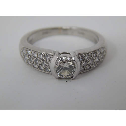 12 - Platinum 950, 1.4ct Diamond Ring Inset with a Central Diamond Approx. 0.80ct & Diamond Shoulders Set... 