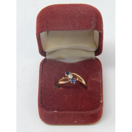 14 - Antique 18ct Gold Ring Inset with a central diamond & flanked by two sapphires. Ring size L.