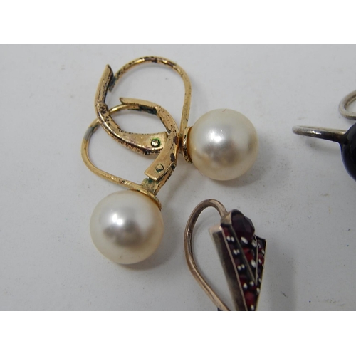 74 - A Pair of simulated pearl earrings, a pair of silver jet & seed pearl earrings, a silver garnet pend... 