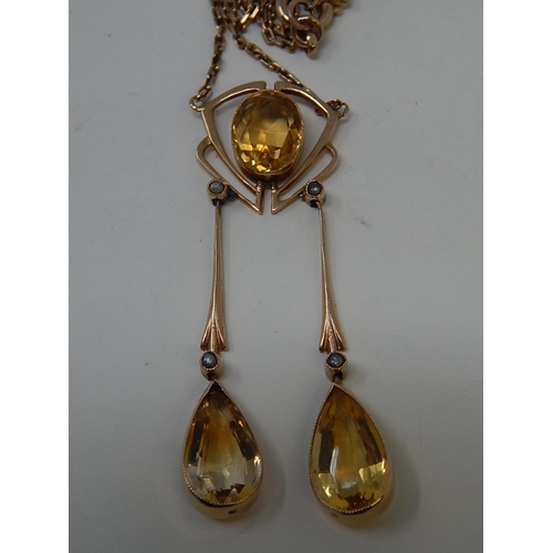 78 - A Gold Chandelier Pendant Necklace set 3 yellow Topaz & 4 seed pearls (Cased).