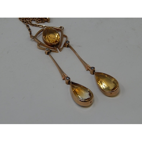 78 - A Gold Chandelier Pendant Necklace set 3 yellow Topaz & 4 seed pearls (Cased).