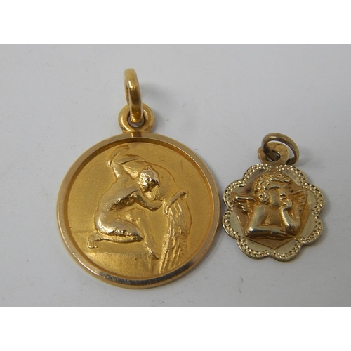 83 - 18ct gold pendant together with an Egyptian gold figure pendant. 2.7g gross