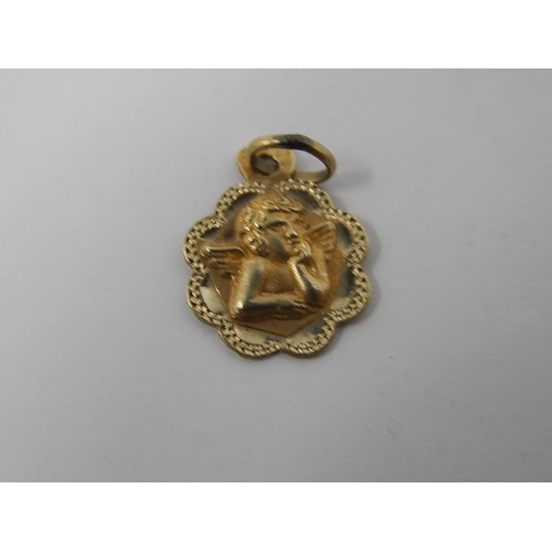 83 - 18ct gold pendant together with an Egyptian gold figure pendant. 2.7g gross