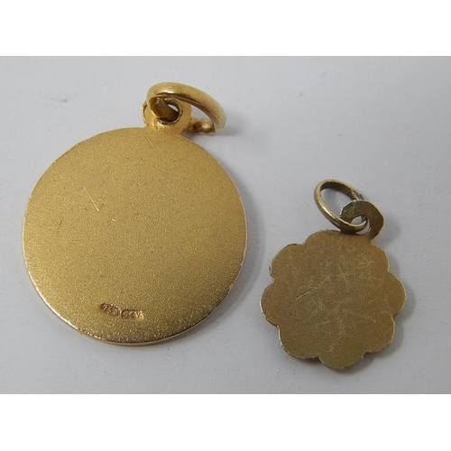 83 - 18ct gold pendant together with an Egyptian gold figure pendant. 2.7g gross