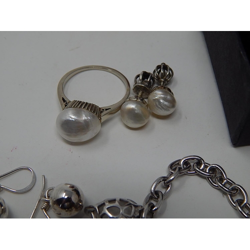 84 - A Large Quantity of Silver Jewellery