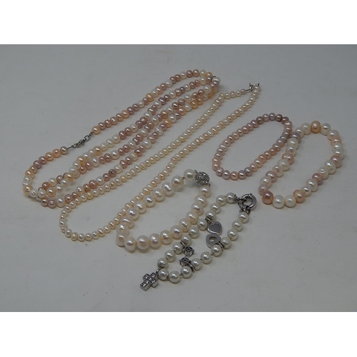 85 - Two Pearl Necklaces, Three Pearl Bracelets & a Charm Bracelet.