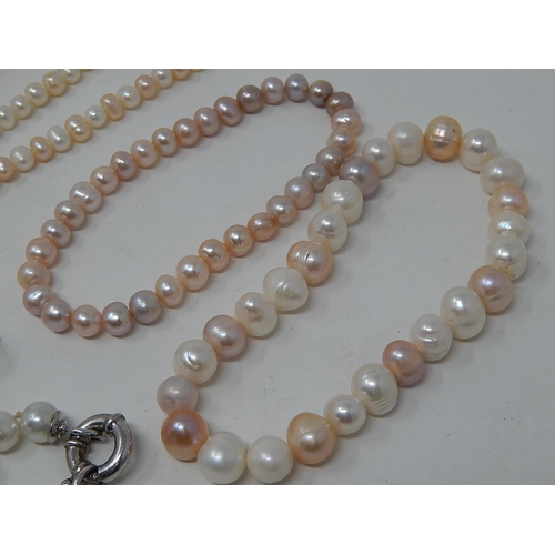 85 - Two Pearl Necklaces, Three Pearl Bracelets & a Charm Bracelet.