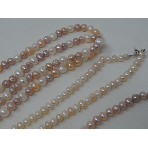 85 - Two Pearl Necklaces, Three Pearl Bracelets & a Charm Bracelet.