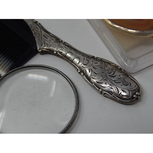 86 - A Quantity of Costume Jewellery together with a magnifying glass & a comb.