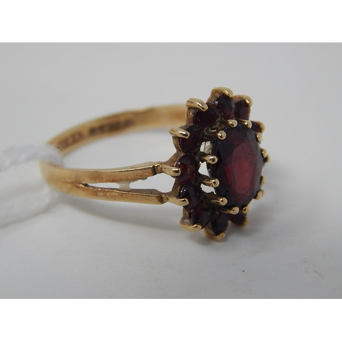 90 - WITHDRAWN: 9ct Gold Hallmarked Ring Inset with Garnets, Ring size M 1/2 in fitted presentation case.